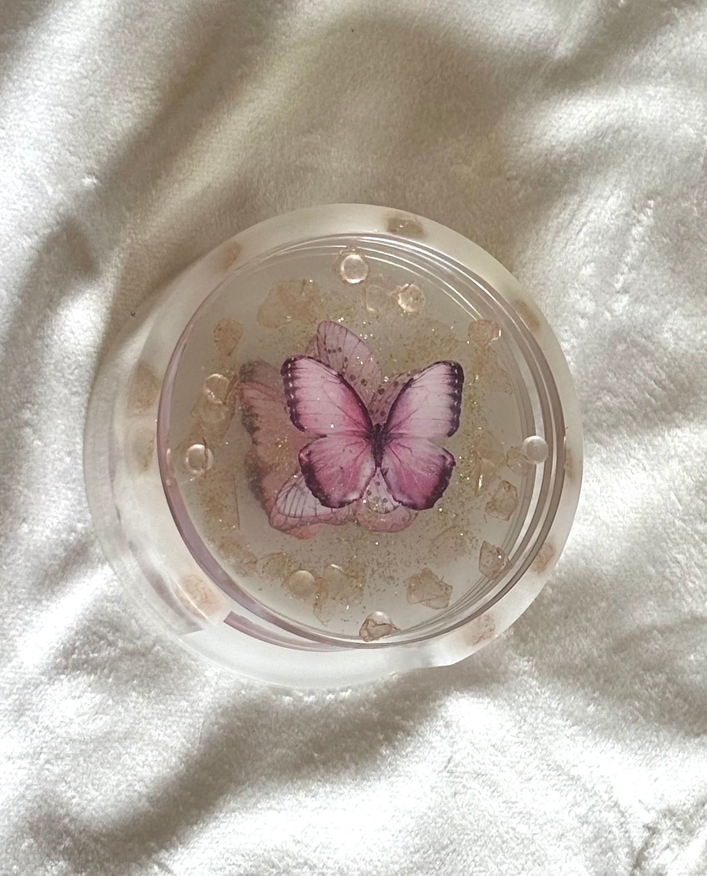 Pink butterfly resin coasters.